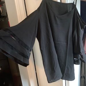 Black blouse. Off the shoulder